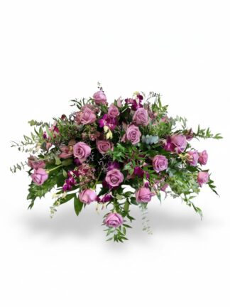 Elegance in Remembrance: Classic Casket Spray with Pink Roses